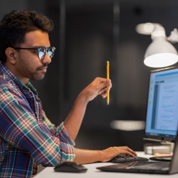 guy sitting in front of computer